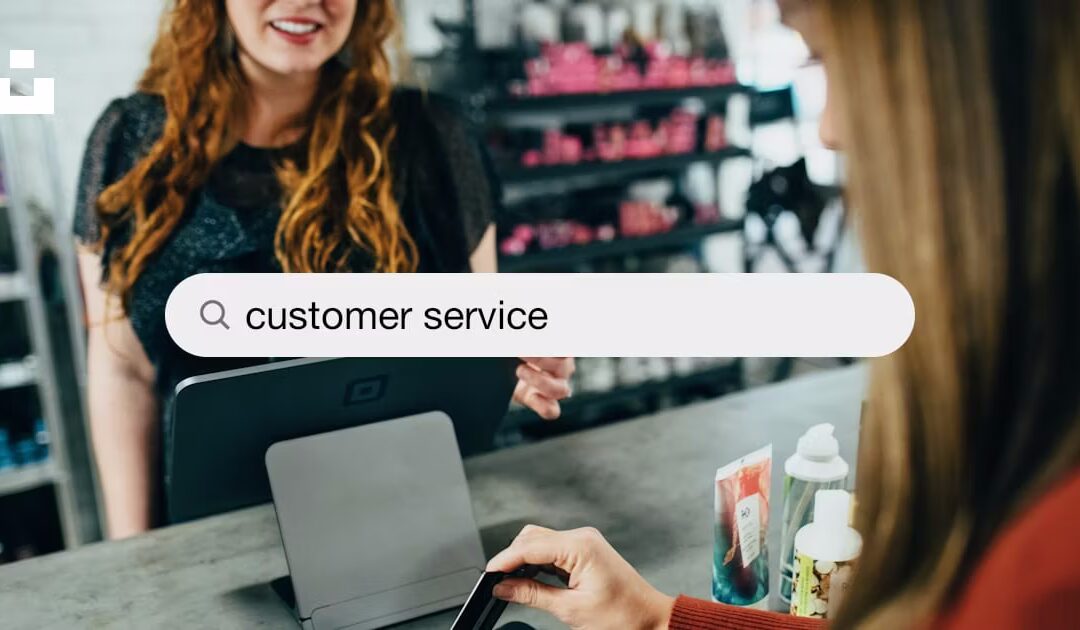 Customer service talking place between a female customer and a female cashier.